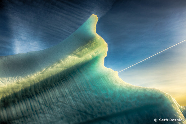 Contrail over berg, Greenland